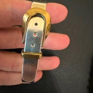 Sterling silver and brass belt buckle bracelet.